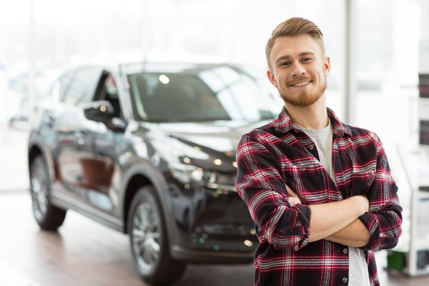 Man stood with his new car