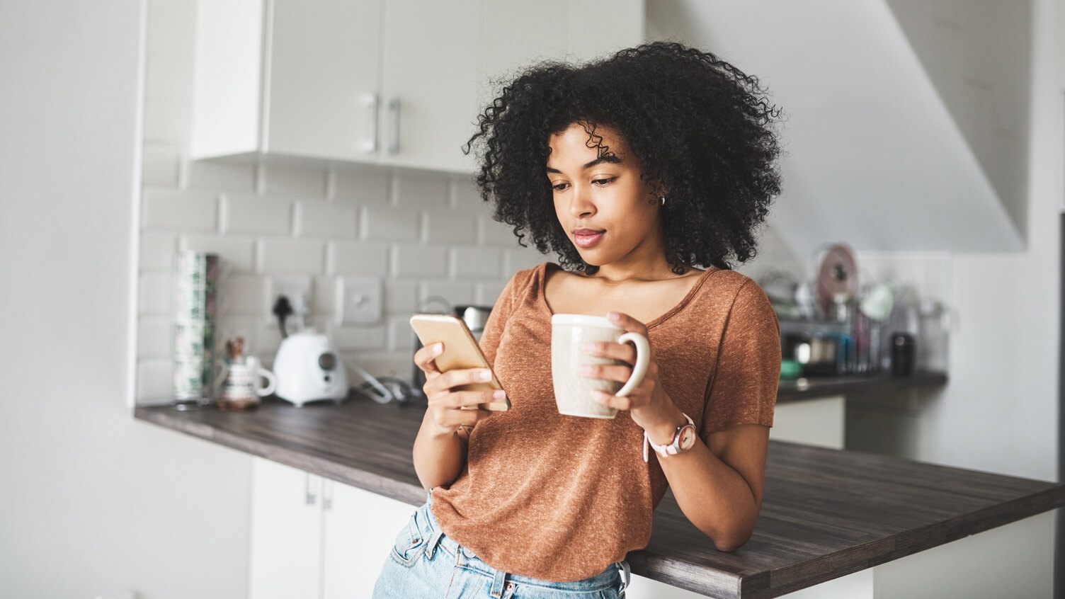 Woman applying for credit on her mobile phone