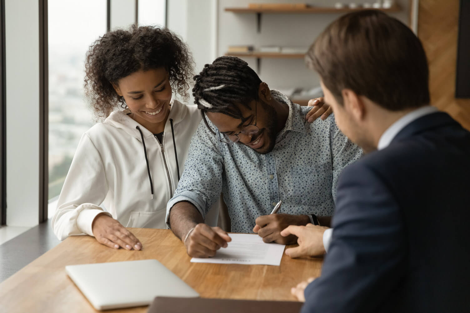 Young couple applying for a mortgage