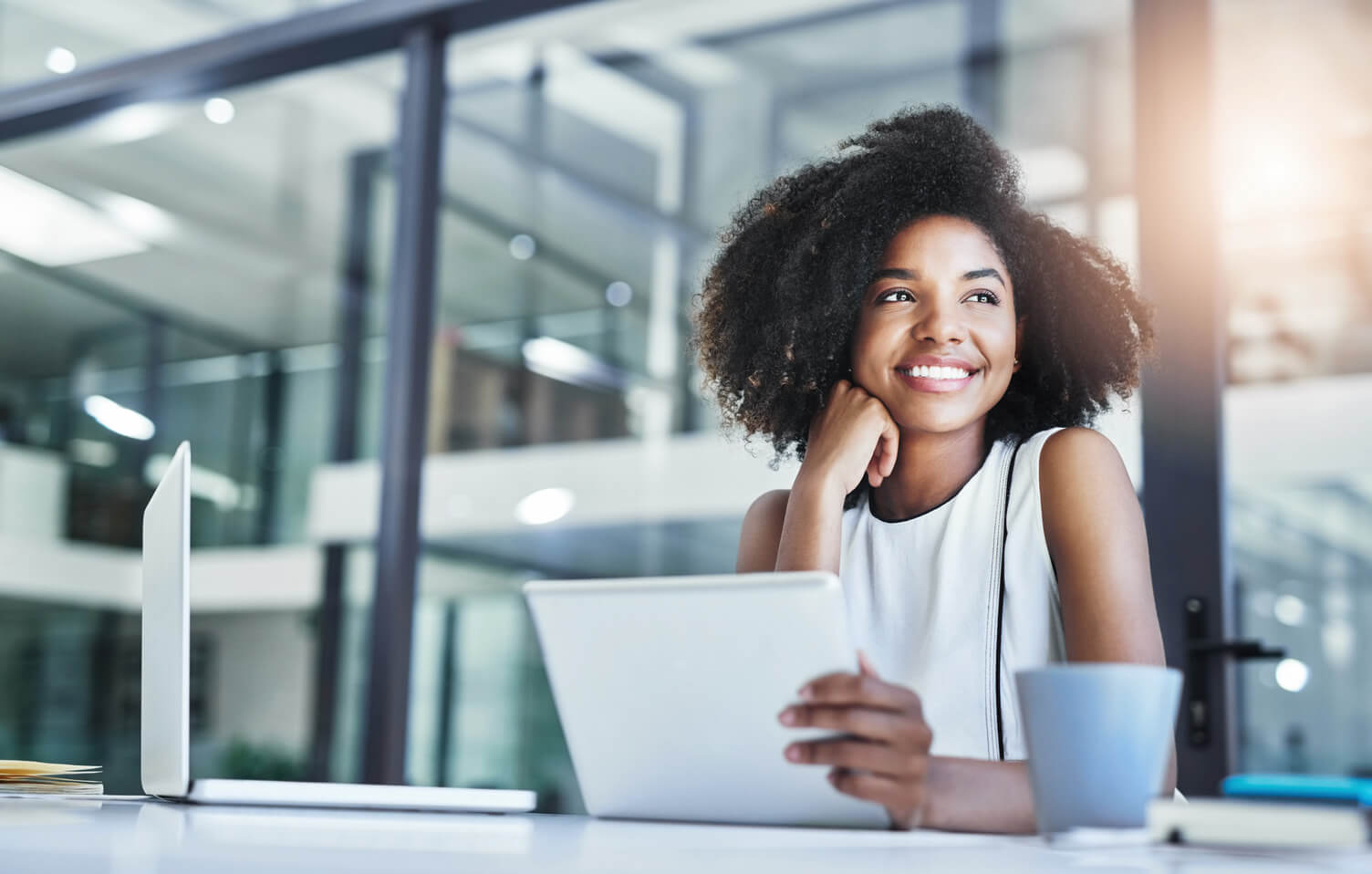 Woman using her laptop to create campaigns using data