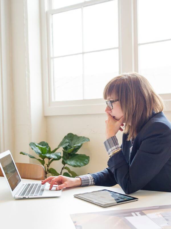 Woman looking over data in the office