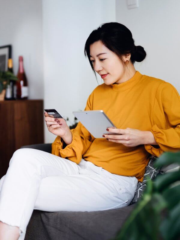 Woman verifying her bank account online